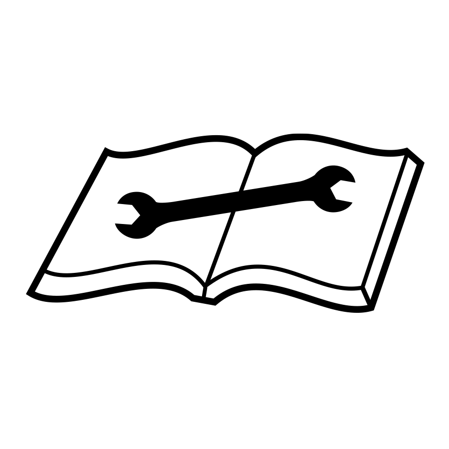 Double ended wrench laying on top of an open book graphic created by Industrial Nameplate